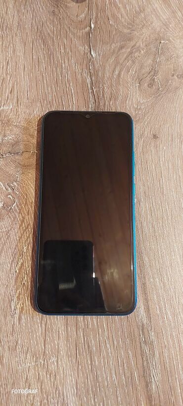 флай тонкий телефон: Redmi 9C, 128 ГБ, цвет - Голубой, Отпечаток пальца, Две SIM карты, Face ID