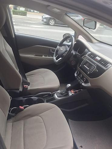 sukan satisi: Kia Rio sedan - Kuzov: sedan, tünd mavi rəng - Mühərrik: benzin - — 5