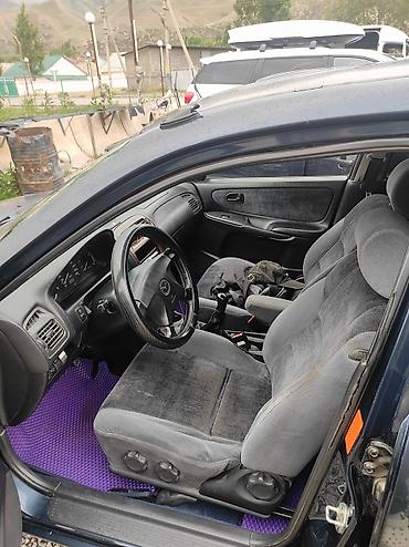 385 55: Mazda 626: 1999 г., 2 л, Механика, Бензин, Седан — 5