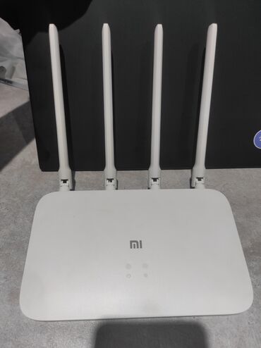 Другие аксессуары для мобильных телефонов: Тип: Mi Router 4A Gigabit Edition Бренд: Xiaomi Wi-Fi роутер
