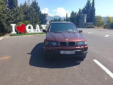 te 28 traktor satisi: BMW X5 (E53), bordoya çalan tünd qırmızı rəngdə SUV. Texniki və — 4