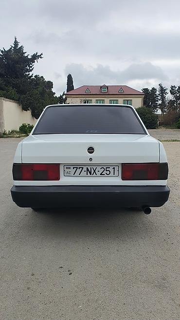 tofaş şahin: Tofaş Şahin sedan Xüsusiyyətlər: - Kuzov: 4 qapılı sedan, ağ rəng - — 2