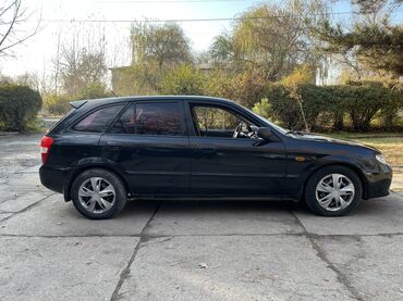 Mazda: Mazda 323: 2002 г., 1.6 л, Механика, Бензин, Хэтчбэк — 1
