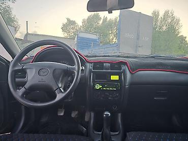 нексия сиденья: Mazda Familia: 1997 г., 1.8 л, Механика, Бензин, Седан — 3