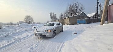 куплен: Hyundai Tiburon: 2001 г., Механика, Бензин, Купе — 7