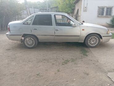 нексия 3 цена в бишкеке: Седан Daewoo Nexia серебристого цвета, представленный на фотографиях