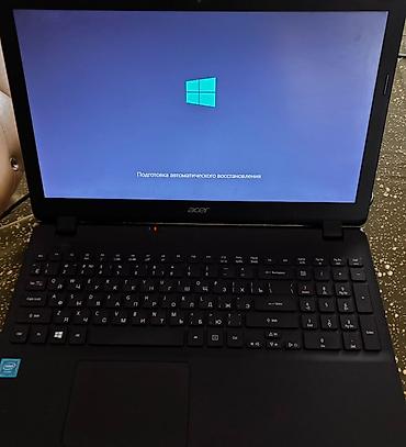 Ноутбуки и аксессуары: Acer brendinə məxsus qara rəngli noutbuk. Cihazda Intel prosessoru — 3