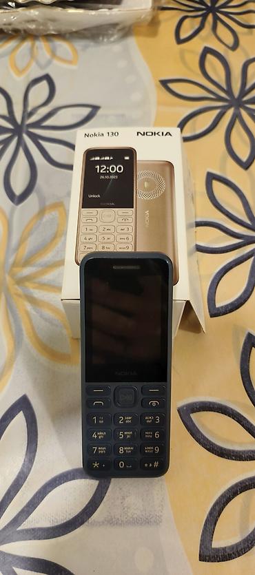 philips xenium f511: Nokia 130, rəng - Göy, Düyməli — 1