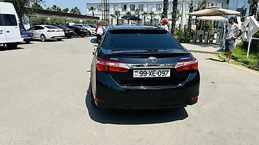 hyundai i30 oluxanası: Toyota Corolla: 1.6 l | 2014 il Sedan — 2