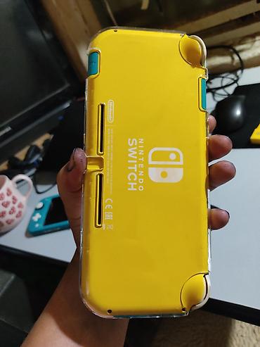 Видеоигры и приставки: Nintendo switch lite чипованный(прошитый) внутренняя память 33гб+64гб — 4