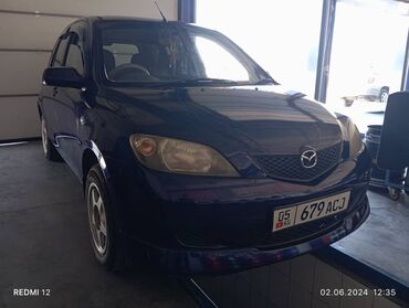 деми: Mazda Demio: 2003 г., 1.3 л, Автомат, Бензин, Универсал