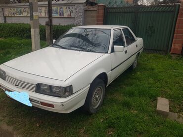 электромобиль neta: Белый седан Mitsubishi Galant, представленный на изображениях