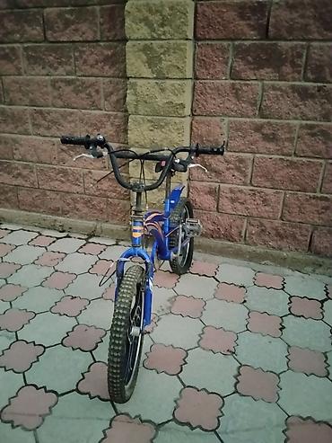 Детский/подростковый велосипед, с колёсами примерно 16"–18"