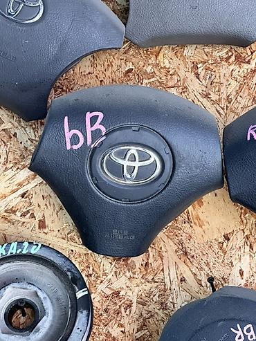 Детали салона: Подушка безопасности (модуль airbag) в центр рулевого колеса Toyota — 1