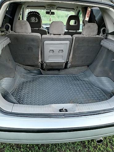 машина на час: Nissan Almera Tino: 2002 г., 2 л, Вариатор, Бензин — 4