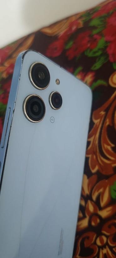 машина чихол: Redmi, Redmi 12, Б/у, 256 ГБ, цвет - Голубой, 2 SIM — 4