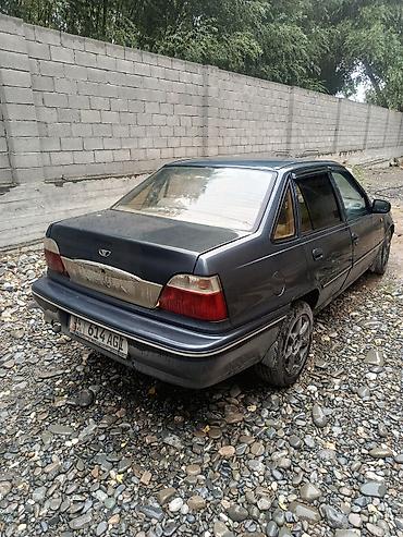 салон машины: Daewoo Nexia: 2003 г., Бензин, Седан — 4