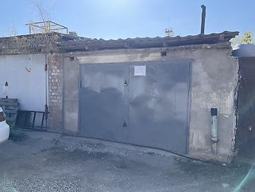 Гараж сатам: Гараж (металлические распашные ворота) Описание: - Капитальный гараж — 2