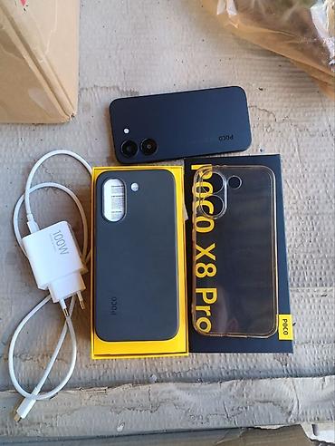 poco m 4pro: Смартфон POCO X8 Pro в чёрном цвете. На фото видно: - модель — 9
