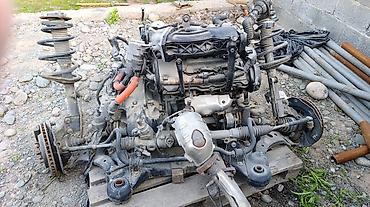 Двигатели, моторы и ГБЦ: Двигатель в сборе с подрамником и подвеской Описание: - Бензиновый — 2