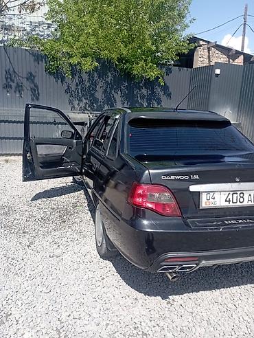 baic eu5: Седан черного цвета с бензиновым двигателем и передним приводом. Кузов — 5