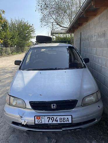 на ходу дымит: Honda Odyssey: 1996 г., Бензин, Минивэн — 4