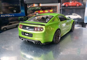 Avtomobil modelləri: Коллекционная модель Ford Mustang Street Racer Green black 2014 — 4