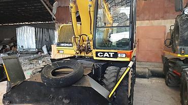 5d полик: Экскаватор, Caterpillar, Колесный — 1