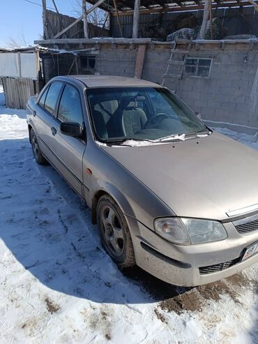 Mazda: Mazda 323: 1999 г., 1.6 л, Механика, Бензин, Седан