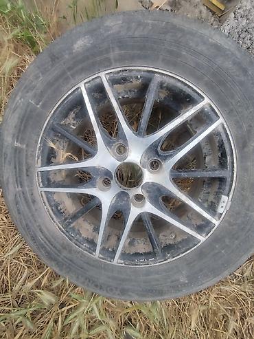 e6 3: Литой автомобильный диск с шиной Хундай аванте 95 год продаю на — 1