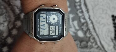 купить наушники с микрофоном: Casio AE1200WH ( корпус: металический и ремешок) Водонепроницаемое до