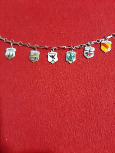 Ostali nakit: Narukvica stara srebrna 835 finoce sa srebrnim privescima na gradove na lalafo.rs — 1 Ostali nakit: Narukvica stara srebrna 835 finoce sa srebrnim privescima na gradove — 1