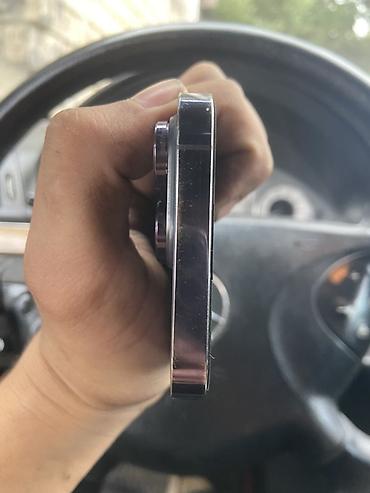 iphone 12 pro max islenmis: IPhone 14 Pro, Deep Purple, Simsiz şarj — 7