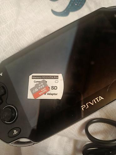 logitech g29 ikinci el: Sony PS Vita portativ oyun konsolu. Komplektdə görünənlər: - PS Vita — 2