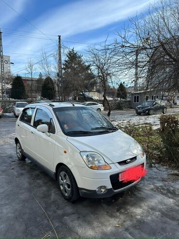 экскаватор погрузчик бу: Белый хэтчбек Daewoo Matiz. Компактный городской автомобиль с пятью