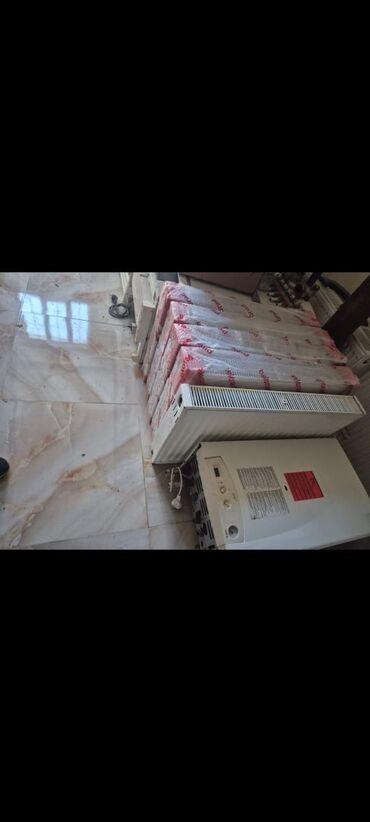 Kombilər: 5 eded Taz panel Radyat 80 sant 1 eded Kombi 24 Lük 650 manat son