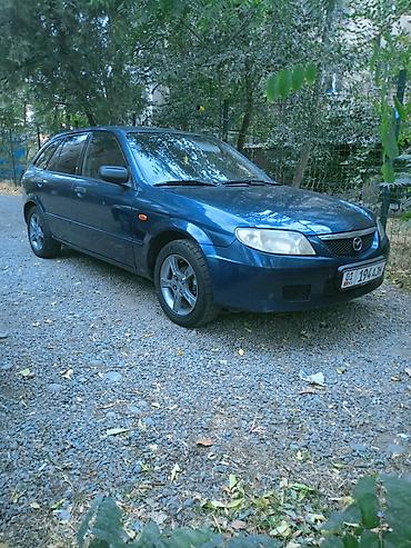 Mazda 323: 2003 г., 1.3 л, Механика, Бензин, Хэтчбэк