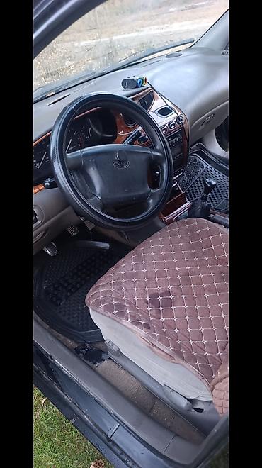 2 4 д: Daewoo Leganza: 1998 г., 1.8 л, Механика, Бензин, Седан — 10