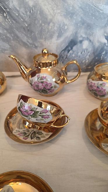 Ovçuluq və balıqçılıq: Çay servizi. Zərli. 6 - fincan, 6 - nəlbəki, 1 - çaynik,1 süd qabı, 1 — 3