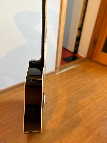jolana gitara: Akustik gitara, 6 sim, İşlənmiş, Ünvandan götürmə — 7