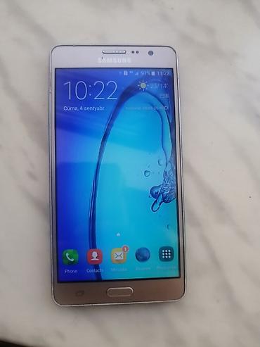 telefon ucun flash kart: Samsung Galaxy On7, 8 GB, rəng - Qızılı, İki sim kartlı — 1