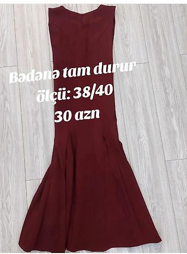 buraxılış paltarları b: Bordo rəngli, bədənə tam oturan uzun don. Qolsuz dizayn, aşağı hissədə — 1