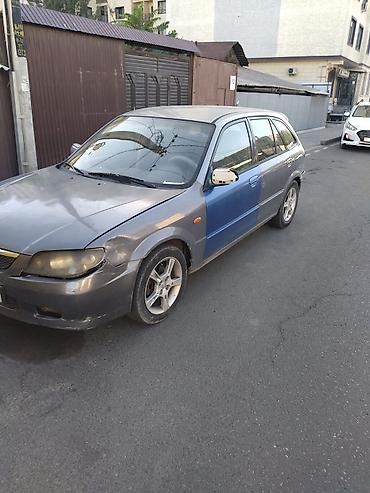 mazda 2000: Mazda 323: 2002 г., 1.6 л, Механика, Бензин, Универсал — 3