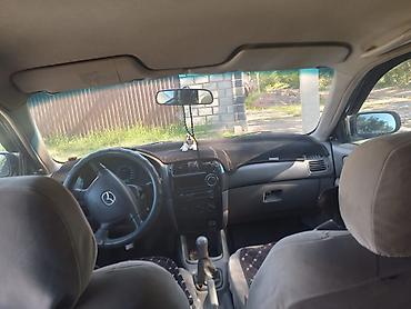 чехол на мопед: Mazda 626: 2000 г., 1.8 л, Механика, Бензин, Лифтбек — 7
