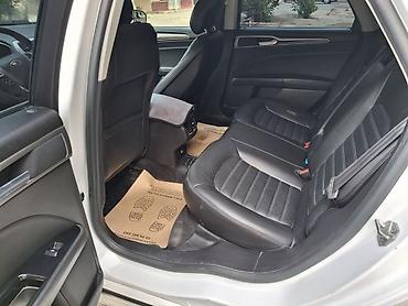 Ford: Ağ rəngdə Ford Fusion sedanı. Bu avtomobilin salonda rahat -da lalafo.az — 4 Ford: Ağ rəngdə Ford Fusion sedanı. Bu avtomobilin salonda rahat — 4