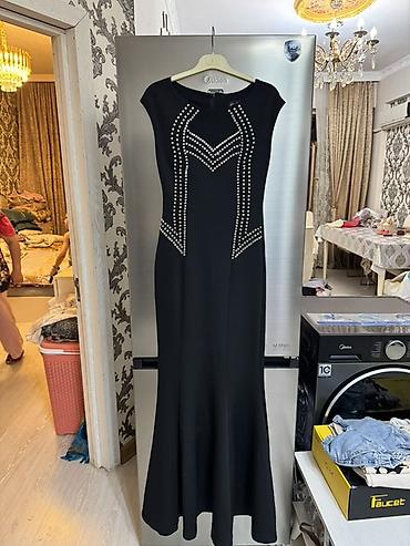 qara pp: Delvina qadın paltarı – 38 ölçü - Rəng: qara - Uzun model, baldırdan — 2