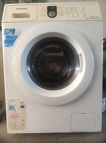 60: Стиральная машина Samsung Diamond WF8590NMW9, фронтальная загрузка — 1