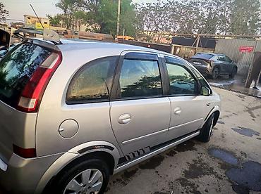 bmw e 36: Opel Meriva, gümüşü rəng, 5 qapı, şəhər və ailə istifadəsi üçün rahat — 2