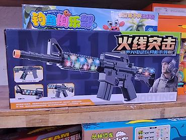 Игрушечный автомат с подсветкой и звуковыми эффектами - Электронная