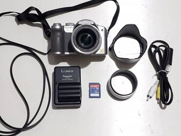 Фотоаппараты: Panasonic DMC FZ7, объектив Leica, флешка, зарядное устройство